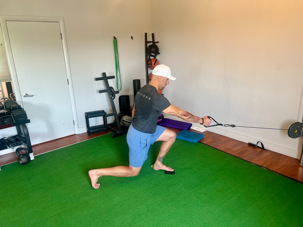 /content/dam/images/golfdigest/fullset/fitness-2024/Gozbekian cable step-back lunge 2.jpeg